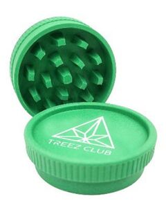 Treez Club Eco Grinder, a high-quality, eco-friendly grinder made from sustainable, recycled materials, featuring sharp teeth for efficient grinding and a unique design to complement any collection of smoking accessories.