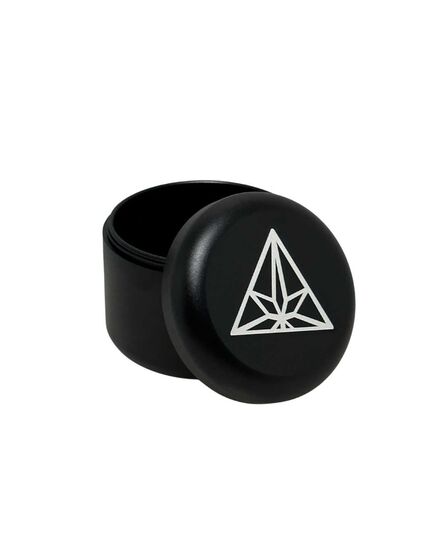 The Treez Club Herb Container Stash Jar, also known as CannaPuck 2.0, in black, showcasing its high-quality aluminum construction and compact, portable design.