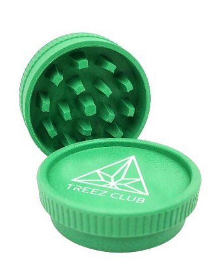 Treez Club Eco Grinder, a high-quality, eco-friendly grinder made from sustainable, recycled materials, featuring sharp teeth for efficient grinding and a unique design to complement any collection of smoking accessories.