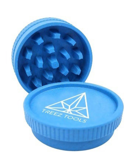 Treez Tools Eco Grinder, a high-quality, eco-friendly grinder made from sustainable, recycled materials, featuring sharp teeth for efficient grinding and a unique design to complement any collection of smoking accessories.