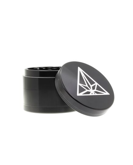 Close-up of the Treez Club 63 mm 4-piece herb grinder, highlighting its precise aluminum build and strong neodymium magnet for secure closure