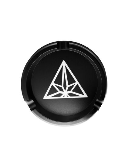 The Treez Club Aluminum Ashtray in black, showcasing its sleek design with three grooves for cigarette placement and a compact size of 90 mm in diameter and 15 mm in height