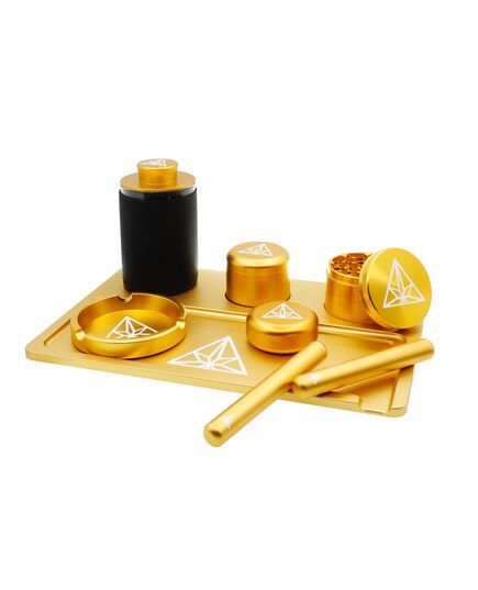 Complete Treez Club Premium Accessories Case set in gold, featuring a rolling tray, herb grinder, ashtray, stash jar, Cannapuck 1.0 & 2.0, mixing bowl, J-covers, and an odor-proof case.